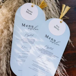Zaokrąglone menu weselne i złoty chwost